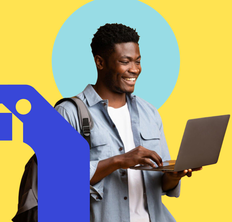 Student smiling with a laptop